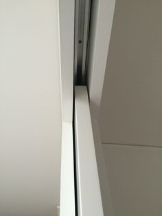 an open door in the corner of a room