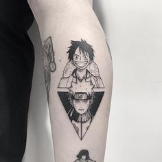 a person with a tattoo on their leg that has an image of two anime characters