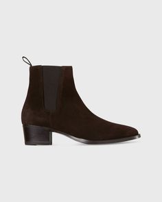 A little bit equestrian, a little bit mod — a Chelsea is one of our all-time favorite boots, with a history that goes all the way back to the 1800s. This pair is made in Italy with a clean silhouette, elastic side panels, the traditional back loop, and a walkable stacked heel. And the brown lamb suede looks especially great with white jeans. Ann Mashburn, Heeled Chelsea Boots, Brown Chelsea Boots, The Way Back, Shoes Flats Sandals, Favorite Boots, Buckle Shoes, Boots And Sneakers, Chelsea Boot