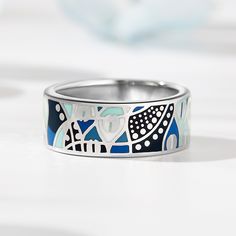 A beautiful sight, this majestic ring features multicolored enamel in an abstract design meant to resemble the road and building of a Europe village. Finely crafted in polished sterling silver, quite simply, this ring is a wearable work of art. With a myriad of colours everywhere, why not add some to your jewelry box with beautiful enamel jewelry. A design you're sure to love!Weight: 5.4 gWidth: 7.2 mmHeight: 1.7 mmThickness: 1.5 mmMaterial: 925 SilverPlating Color: Silver Europe Village, Enamel Rings, Jewellery Ideas, Beautiful Sights, Enamel Ring, Enamel Jewelry, Abstract Design, The Road, Jewelry Box