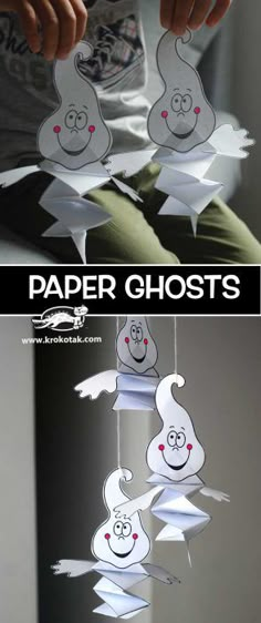 paper ghost mobile hanging from the ceiling with text overlay that reads, paper ghosts