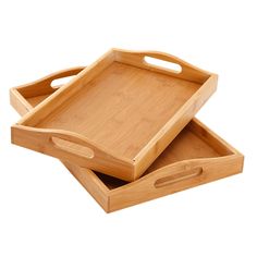 two wooden trays sitting on top of each other