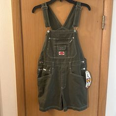 Revolt Clothing Co Women’s Shortalls Overalls In Army Green. Brand New With Tags. Y2k, 90s. Measures 32 Inches In Total Length And 4 Inch Inseam. Size Women’s Large. Casual Bib Front Overalls For Streetwear, Revolt Overalls, Green Dungarees, Character Chart, Green Overalls, Male Clothes, Overalls Outfit, Gardening Outfit, Jean Overalls