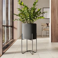 a potted plant sitting on top of a metal stand