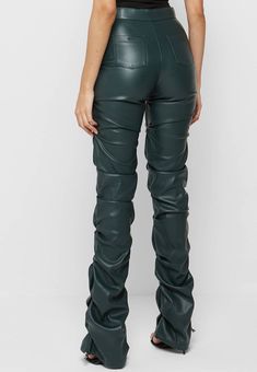 Back in stock! Elevate your wardrobe with our Trinity Faux Leather Pants. These ruched, faux leather pants exude a chic and exclusive vibe, while the fit and flare design flatters your figure. Add a touch of sophistication and luxury to any outfit with these must-have pants. Details: High waist, front zipper, fit and flare, ruched Size Chart: Small: Waist 26, Hip 33, Length 42Medium: Waist 27, Hip 35, Length 43Large: Waist 29, Hip 36, Length 43X-Large: Waist 30, Hip 38, Length 442X-Large: Waist 32, Hip 40, Length 44Model size small 5'8" 36-26-38 Made In: China Fabric Contents: Polyester Top Wedding Dresses, Leather Pant, Bungee Cord, Costume Intero, Flare Trousers, Leather Trousers, Adjustable Waistband, Faux Leather Pants, Care Label