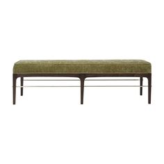 an upholstered bench with wooden legs and a green fabric seat cover on it