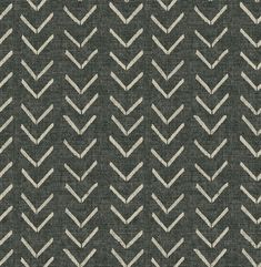 an upholstered fabric with white arrows on grey groundcloth, designed in the style of zigzag