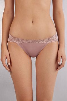 Low rise panties in lace with soft microfiber front. Based on the color chosen, the lace can be of contrast color or tone-on-tone. Inner gusset in 100% cotton.
The model is 5’ 9” (175 cm) tall and is wearing a size 2 / S. Leni Klum, Undershirt Tank Top, High Waisted Briefs, Cotton Bras, Strapless Bandeau, Corset Lingerie, Bra Types, Tank Top Camisole, Swimwear Sale