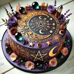 a cake decorated with purple and gold decorations