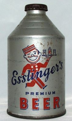 an old fashioned metal beer can with a smiling clown on it