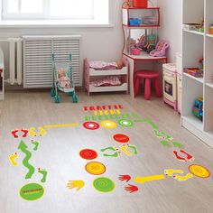 a child's play room with toys and decor