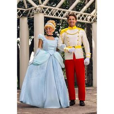 a man and woman dressed as disney characters