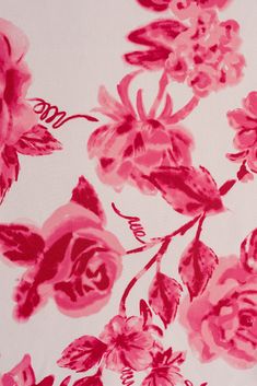 pink and red flowers on white background with black outline in the center, closeup