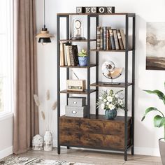 a bookshelf with several shelves and drawers in a living room next to a potted plant