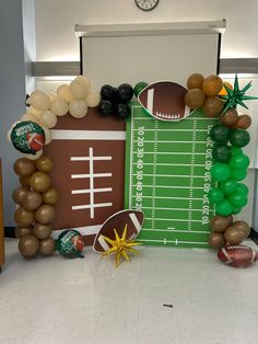 a football themed party with balloons and decorations