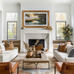 a living room filled with furniture and a fire place in front of a painting on the wall