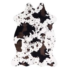 a black and white cow print rug on a white background