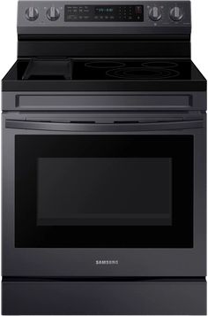 a black oven with the door open and an electric stove top on it's side