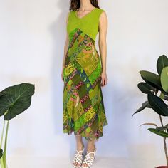 "Vintage patchwork maxi dress Amazing patchwork chiffon dress with a pointed empire waistline and a knit green bodice. Has a v-neckline and scalloped hems. The knit top is chartreuse green, the skirt has multiple shades of green, pinks, orange & maroon. Has a green chiffon lining in the skirt area. Made in the early 2000s by Aldo Martin's, made in Spain. Perfect condition Measurements are taken flat Full measurements provided Stretch is included in measurements Tag size: 10 (medium) Chest: 32\"-36\" Waist: 30\"-34\" Hip: 42\"-44\" Length (shoulder to hem)- 49\" Fabric content: cotton bodice, polyester skirt" Knit Patchwork, Dress Y2k, Chartreuse Green, Empire Waistline, Vintage Patchwork, Green Outfit, Scalloped Hem, Vintage Knitting, Early 2000s