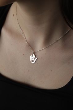 This cute 925 sterling silver necklace is a must for every woman. Can be worn alone, or layered with other necklaces for a trendier look. This silver animal necklace comes in a beautiful box, gift-ready!  ❤️ It would be an amazing gift for Anniversary, Birthdays, Christmas, Mother's Day, Women's Day. FEATURES - Material: High Quality Solid 925 Sterling Silver - Pendant height: 1.8 cm - Pendant width: 1.5 cm - Color Options: Silver, Yellow Gold, Rose Gold - Chain length 16 inches, 18 inches or 20 inches ❤️Production Techniques: Handmade and Laser Cutting (for High Quality) PACKING ❤️ All products are ready to be sent to you in stylish gift boxes. Also, there is no need for gift wrapping. SHIPPING AND RETURN - Production is made according to the order and delivered to the cargo next day. - S Dainty Silver Necklace, Animal Necklace, Necklace For Mom, Gift For Anniversary, Hand Necklace, Family Necklace, Baby Hands, Rose Gold Chain, New Mom Gift