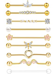 a set of six different types of gold barbells with pearls and flowers on them