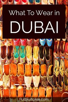 a display case filled with lots of different types of shoes and the words what to wear in dubai