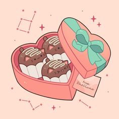 a pink box filled with chocolate covered donuts