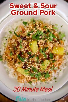 a white plate topped with rice and vegetables