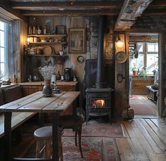 an old fashioned kitchen with wood burning stove