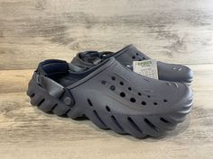 Crocs Echo Clog Sandals Storm Gray Men’s 11 Womens 13 Shoes Slip On Comfort. Brand new with tags! Elevate your shoe game with these stylish Crocs Echo Clog Sandals in Storm Gray. Perfect for any occasion, these slip-on shoes are designed for both men and women with a UK shoe size of 10 and US shoe size of 11. The solid pattern and colorful theme make them a versatile choice for travel, activewear, casual outings, and workwear. Featuring a lightweight and breathable foam upper material, synthetic Crocs Mens Clogs, Crocs Echo Clog, Echo Clog, Crocs Echo, Crocs Men, Clog Sandals, Perfect Man, Mens Sandals, Shoe Game