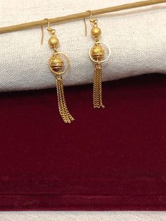 Christmas Gift, Holiday Gift,  Gold Earrings for Women, Indian Jewelry, 24 k gold filled dangle drop earrings Hanging Earrings, 24 k gold filled dangle drop earrings, Drop Earrings Get this beautiful piece for that final touch to your beauty look. Trendy design suitable for all occasions, wedding, party wear, Anniversary, birthdays. Lovely long Tassel Earrings are handcrafted in 24k gold filled. Material: 21k gold plated Size 3 inches approx. Lead and Nickle free Hypoallergenic Gold Earrings For Women, Long Tassel Earrings, Party Kleidung, Hanging Earrings, Tassel Earrings, Indian Jewelry, Women's Earrings, Gold Earrings, Gifts For Mom