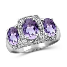 A VIBRANT ACCENT PIECE THAT GLOWS FROM WITHIN Made with real Amethyst Gemstones, White Diamonds & 0.925 Sterling Silver Unlike cheaply made gemstone rings for women that turn out to be fake, with dull, flat-looking faux stones, the JewelersClub Amethyst Ring features a genuine 2.50 carat Amethyst stone flanked by real White Diamond clusters. Crafted with care and expert workmanship and set in a hypoallergenic, 0.925 Sterling Silver band, this gorgeous Purple Oval ring is durably made with premium materials that set it apart from the rest. Our Genuine Amethyst Ring features: - 2.50 Carat Amethyst Gemstone - White Diamond Clusters - Hypoallergenic 0.925 Sterling Silver Band Ring (zero nickel or lead) - Delicate Design with Durable, Long-Lasting Craftsmanship A stunning gift for your signific Luxury Sterling Silver Amethyst Birthstone Ring, Unique Hallmarked Amethyst Ring In Sterling Silver, Amethyst Jewelry Ring, Sterling Silver Multi-stone Amethyst Ring, Nickel-free Silver Amethyst Ring In Sterling Silver, Multicolor Multi-stone Amethyst Ring In Sterling Silver, Sterling Silver Rings Bands, Silver Jewelry Rings, Amethyst Jewelry