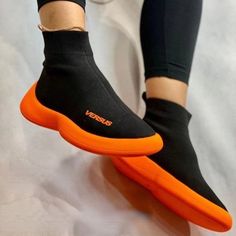 15% MORE OFF FOR ORDER OVER $89.95 USE COUPON CODE: saveme15 These versatile sneakers feature a modern yet simple design. They are made with soft Breathable Mesh uppers with elasticated collars, thick Comfy soles, and classic finish. You will be the coolest person in town when you wear this Versus Women Sneakers. Note: Our size is just for reference, please choose your size according to your true foot length against our size chart.LIMITED STOCK! SOLD FAST!* This item should arrive in 2-3 weeks f Black High-top Sneakers With Contrast Sole For Jogging, Casual Black Breathable Slip-on Sneakers, Casual Black Slip-on Sneakers With Contrast Sole, Trendy Black Breathable Slip-on Sneakers, Black Flat Slip-on Sneakers For Streetwear, Trendy Flat High-top Sneakers For Streetwear, Trendy Black High-top Sneakers With Rubber Sole, Black Stretch Sneakers With Round Toe, Black Mid-top Slip-on Sneakers For Sports