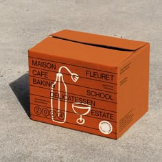 an orange box sitting on the ground