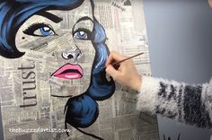 a person is painting a woman's face with blue hair and lipstick on newspaper