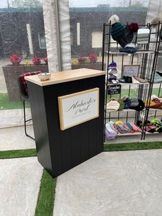 a display case in front of a window filled with shoes