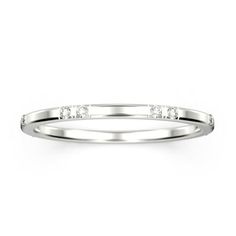 a white gold wedding band with five diamonds