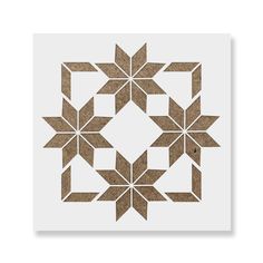 an image of a paper cut out with squares and stars in the shape of flowers