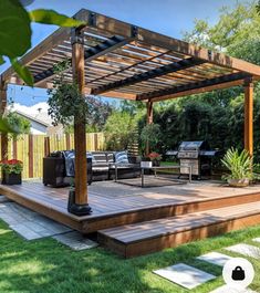 a wooden deck with chairs and grill in the background