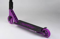 an electric scooter with purple wheels on a white background