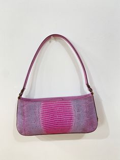 All Reserve items are final sale. Lilac leather embossed baguette. Magnetic closure. Comes with For the Ages dustbag. Condition: EXCELLENT/VERY GOOD Dimensions: Width: 10.6" Height: 4.7" Depth: 2" *** Our scale is based on the following: Excellent Items look visually unused. Very Good Items show minor signs of wear. Good Items show moderate signs of wear. Shoes may show wear such as moderate scuffing at the soles, insoles and heels. Handbags and accessories may show wear such as worn corners, mo Textured Leather Rectangular Baguette Bag, Designer Leather Handheld Baguette Bag, Designer Handheld Leather Baguette Bag, Pink Leather Baguette Bag For Daily Use, Textured Leather Baguette Bag, Luxury Textured Leather Top Handle Baguette Bag, Luxury Textured Leather Satchel Baguette Bag, Luxury Soft Leather Baguette Bag, Luxury Soft Leather Rectangular Baguette Bag