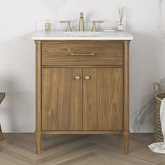 a bathroom vanity with marble top and wooden legs