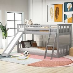 there is a bunk bed with a slide on the bottom and stairs to the top