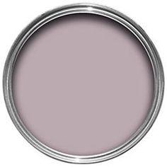 a pink paint in a metal tin on a white background, with the lid open