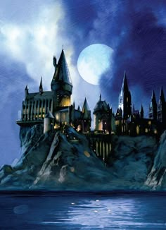 hogwart's castle is lit up at night with the moon in the background