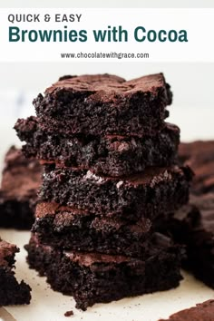 a stack of chocolate brownies sitting on top of a white plate next to each other