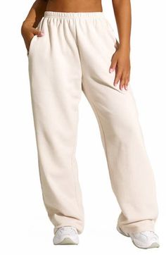 These high-rise elastic-waist sweatpants made from comfy cotton-blend fleece are ones you'll reach for each time lounge day comes around. 33" length (size Small) Elastic waist Side-seam pockets 80% cotton, 20% polyester Hand wash, line dry Imported Baggy Joggers With Elastic Waistband For Loungewear, Baggy Sweats With Elastic Waistband For Loungewear, Baggy Sweats With Elastic Waistband For Leisure, Baggy Sweatpants For Loungewear, Cozy Sweatpants With Ribbed Waistband, Oversized Elastic Waistband Joggers For Loungewear, Baggy Pants For Loungewear, Cozy Leisure Sweats, Oversized Joggers With Elastic Cuffs For Loungewear