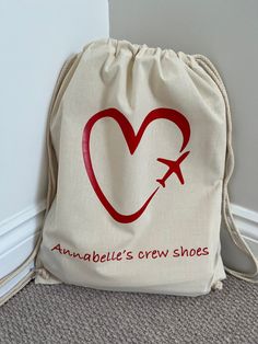 Visit www.cobbleandbodgecrafts.com for discounted rates! Cotton canvas shoe bag for holding flight shoes with drawstring strap for easy carrying  Personalise with your chosen image, name and staff number if required in your chosen colour. Please message if you chosen colour is not listed  Bag measures approx 46cm x 37cm Flight Shoes, Trolley Dolly, Canvas Shoe, Shoes Bag, Shoe Bags, Cabin Crew, Disco Party, Flight Attendant, Choose Colors