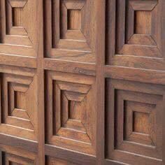 a close up view of some wooden doors