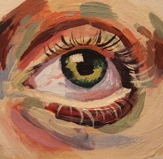 an eye painted with different colors and shapes